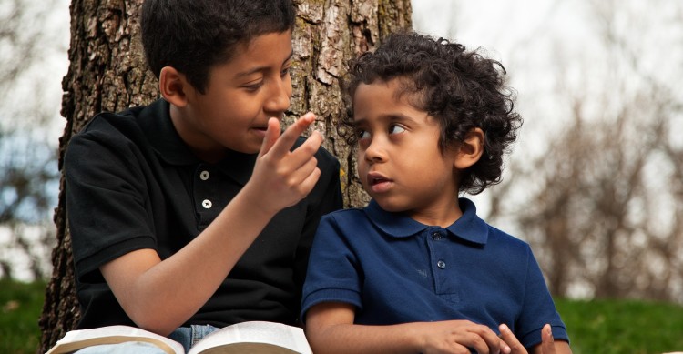 Brothers Sitting Under a Tree
