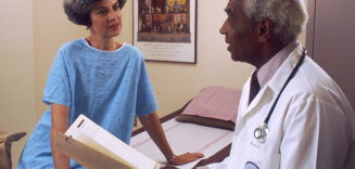 Doctor_consults_with_patient_ courtsey National institute of health