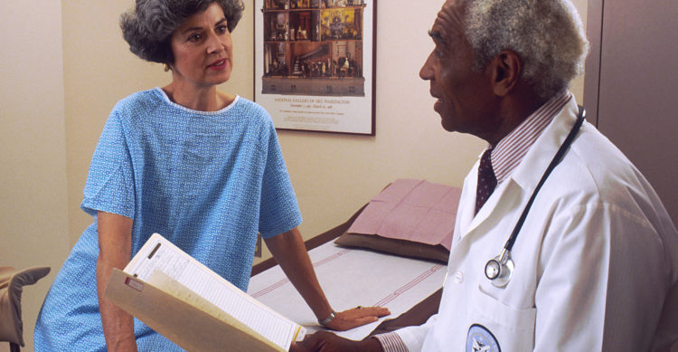 Doctor_consults_with_patient_ courtsey National institute of health