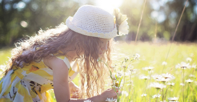 Child picking flowers