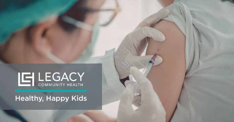 Healthcare worker administers a vaccine to a patient’s upper arm with the Legacy Community Health logo and 'Healthy, Happy Kids' slogan overlayed.