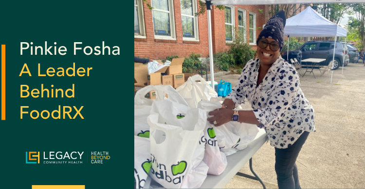 Smiling woman in a patterned top arranges white FoodRX bags on a table at an outdoor food drive; left teal panel reads 'Pinkie Fosha: A Leader Behind FoodRX' with Legacy Health logos.